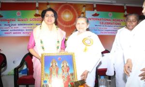 9. BK Laxmiji Presenting the Godly gift