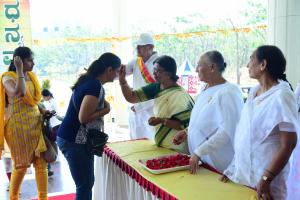 Brahma Kumaris Welcomed by applying ‘Tilak’ on their foreheads and greeted with flower.